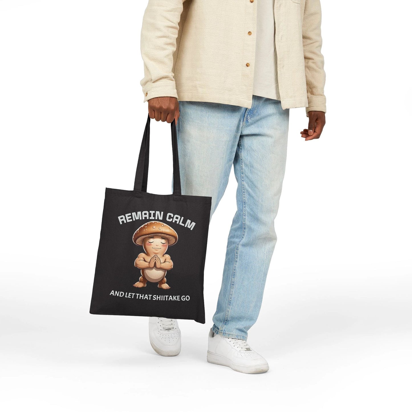 Black Tote Bag — "Remain Calm and Let That Shiitake Go" Cute Mushroom Meditation Canvas Tote by Printify