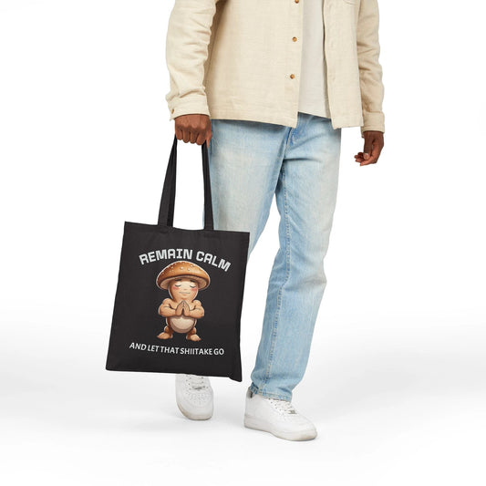 Black Tote Bag — "Remain Calm and Let That Shiitake Go" Cute Mushroom Meditation Canvas Tote by Printify